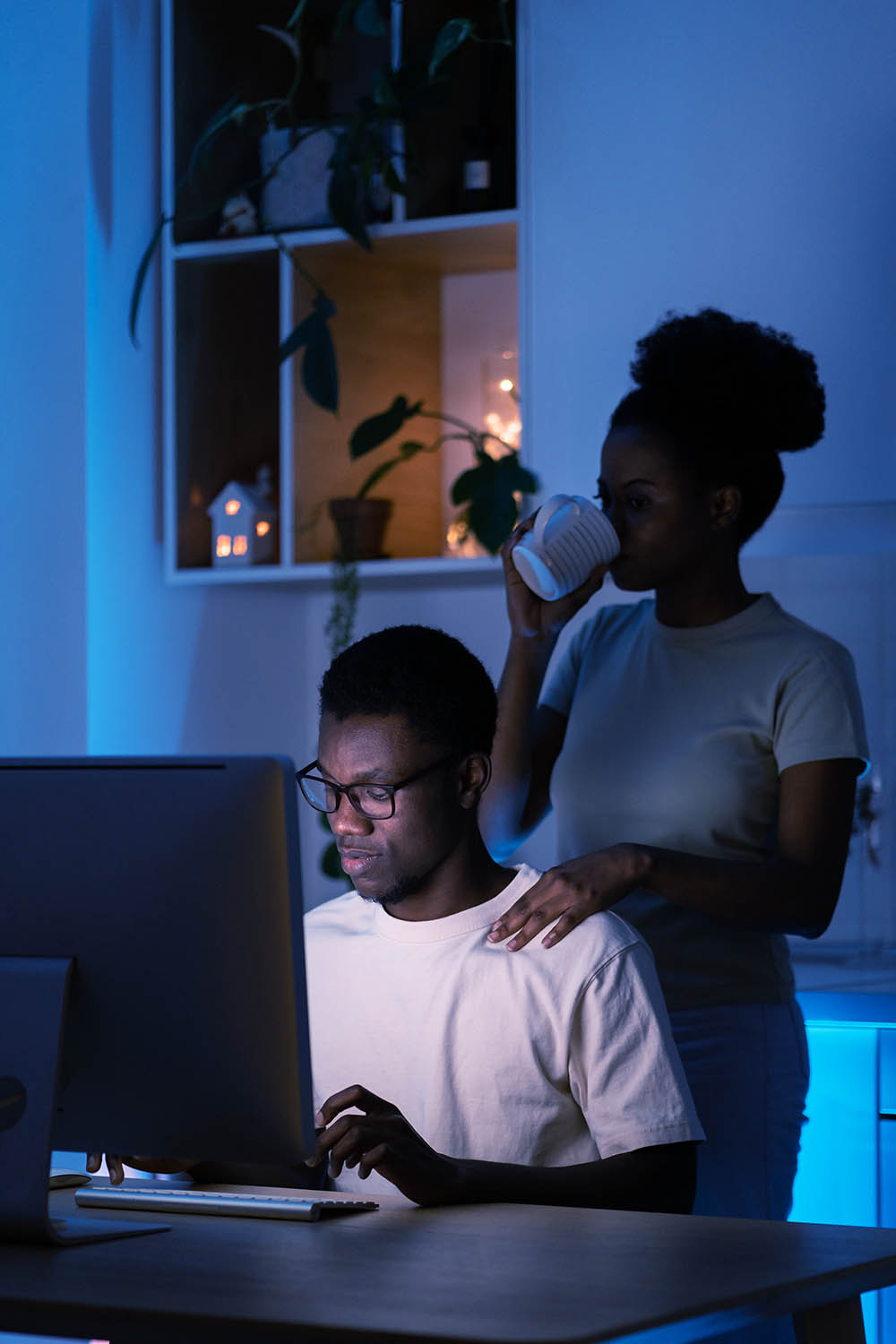 Young couple reviewing insurance plans on Pennie